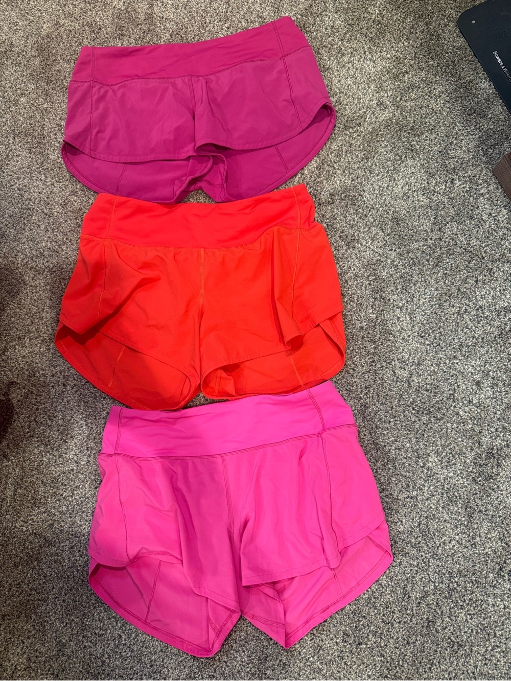 lululemon layered running shorts set of 3 pair— magenta, red, hot pink